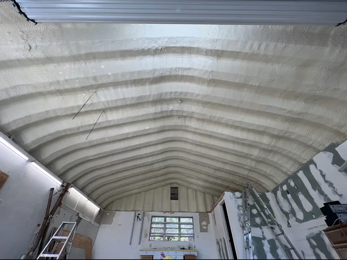 Spray polyurethane foam applied to the underside of a metal roof deck in Avon Lake